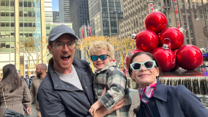 Reed, his wife, and their son navigating the crowds near Rockefeller Center during a mid-December weekend in 2023 - a testament to a successful journey that started at Phoenix College.