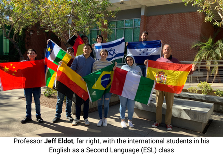 Phoenix College Professor Jeff Eldot, far right, stands with the international students in his English as a Second Language class during the Parade of Flags during Arizona International Education Week. 