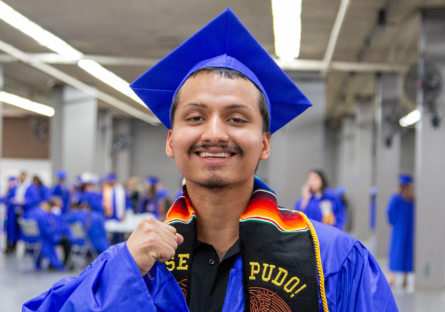 Luis Duque at the May 2024 Phoenix College commencement ceremony where he received his Associate's degree in Criminal Justice